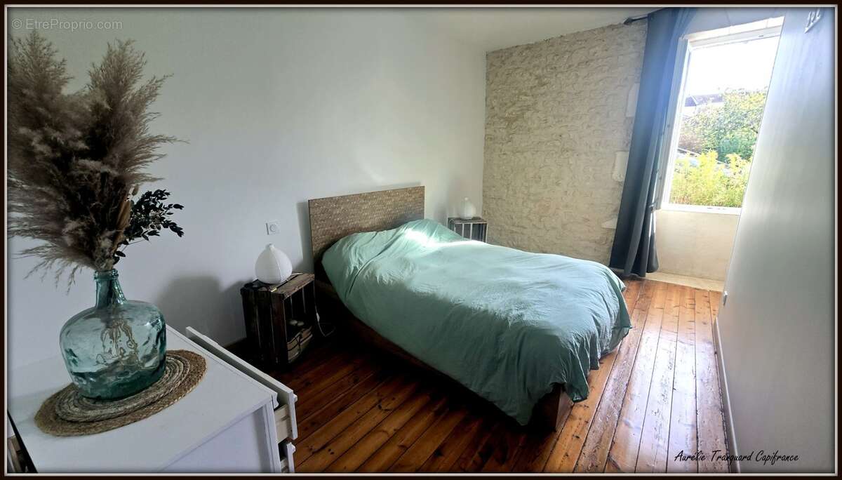 Maison à vendre 5 pièces d'environ 126m² à SAINT JEAN D'ANGELY (17) 4 chambres, 1 garage, proche centre ville, sur un terrain d' - photo 14