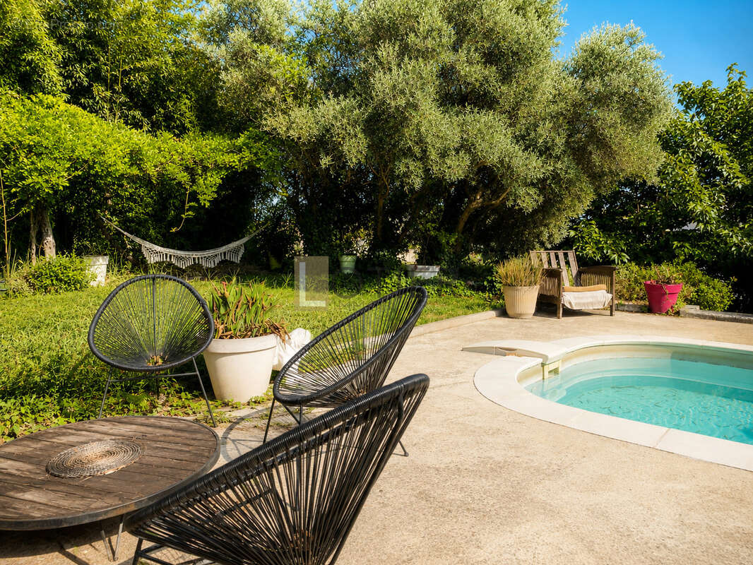 BELLEGARDE   Villa familiale avec vue dégagée, piscine, dépendance T2 et vaste garage - photo 18