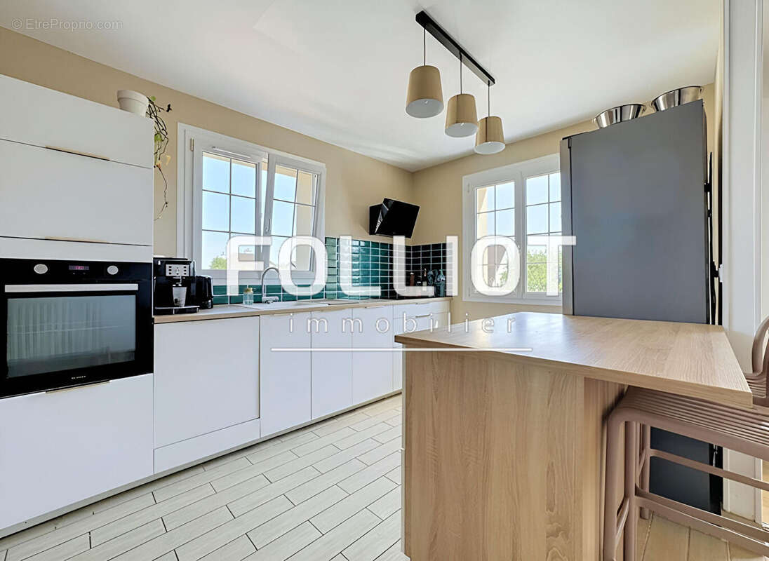 A vendre verson  maison 135m²  4 ch plain-pied sous-sol jardin - photo 4