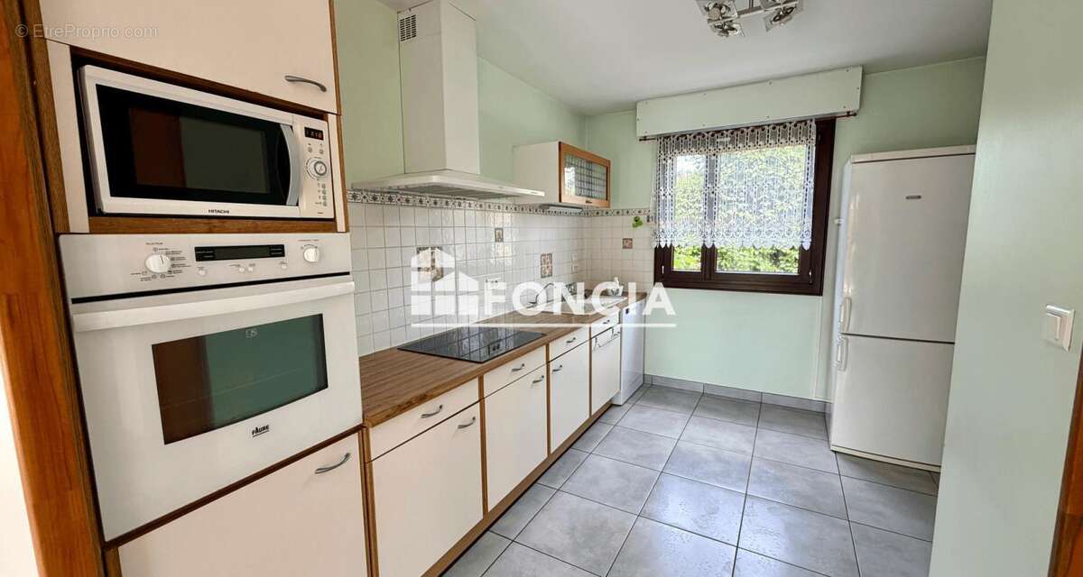 A proximité du parc à Saint-Apollinaire, très agréable et spacieuse maison jumelée sur 3 niveaux - photo 3