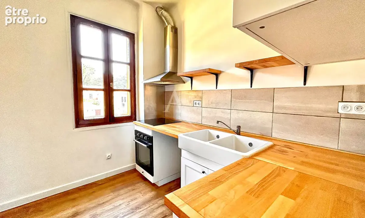 Appartement type 4 renove vue mont d'or  au centre ville avec cave - photo 3