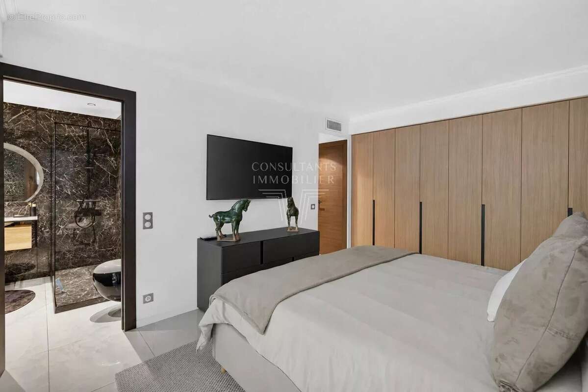Appartement d'exception en rez-de-jardin. - photo 11