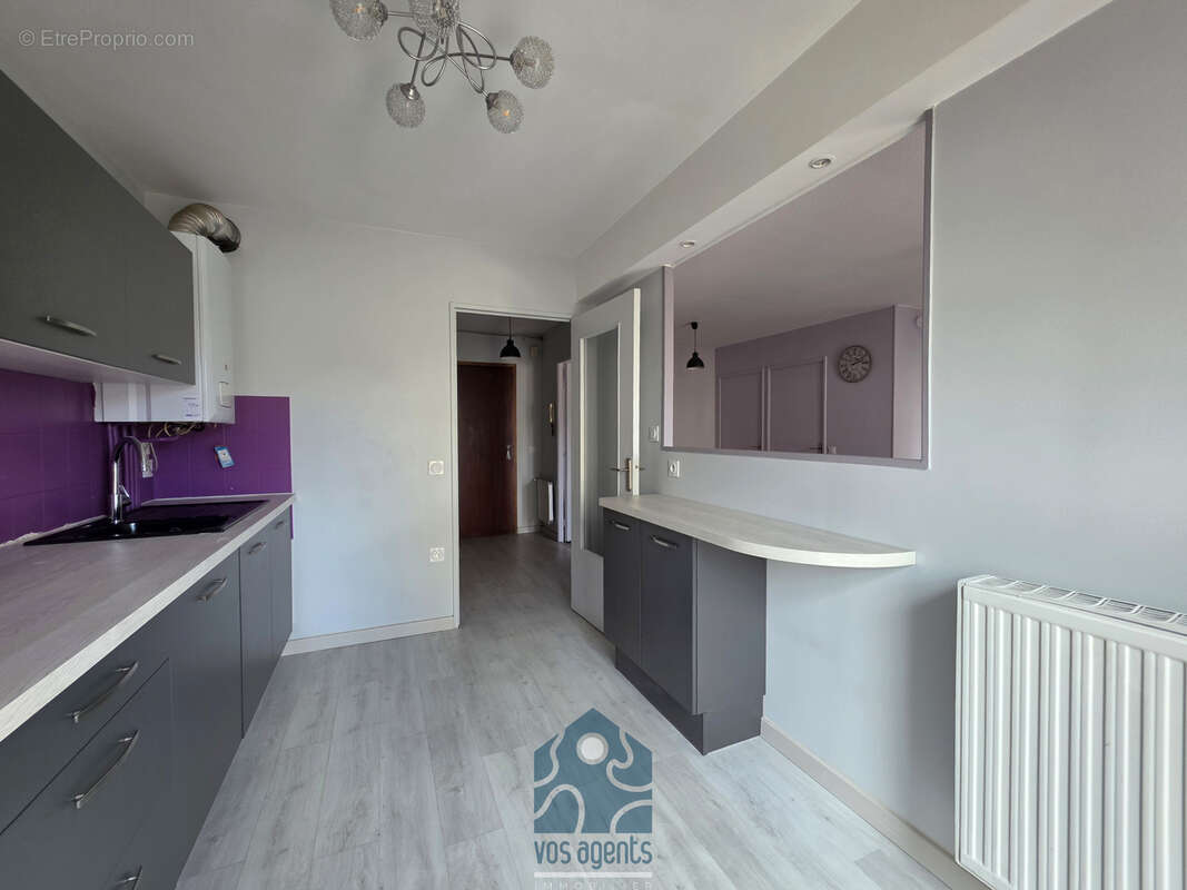 Appartement deux pièces avec cave et stationnement privatif - photo 4