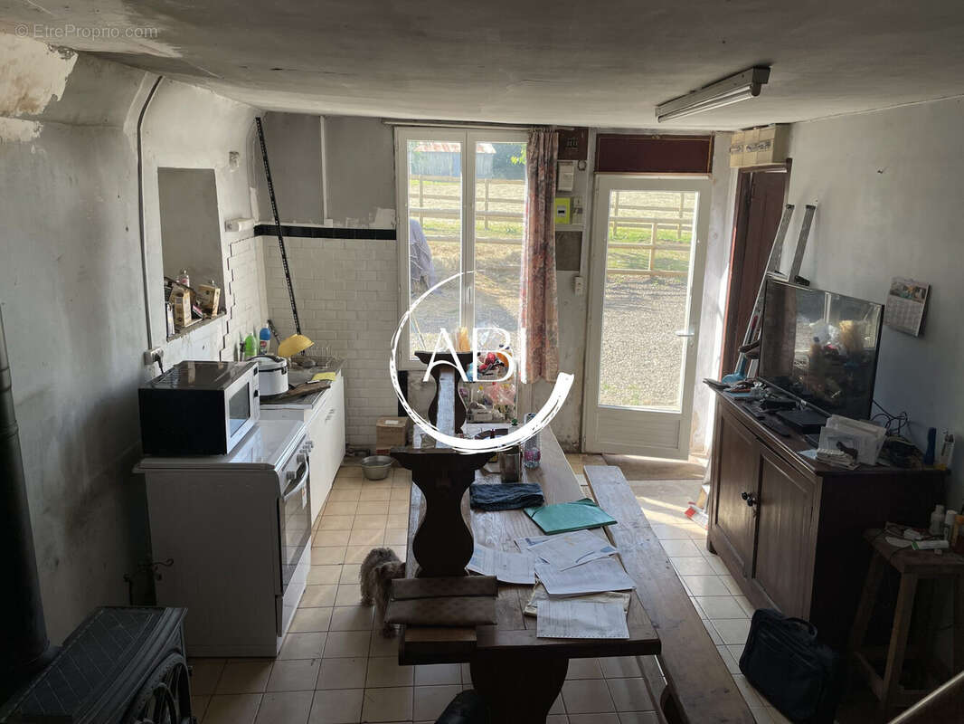 Maison à LE MENIL-DE-BRIOUZE