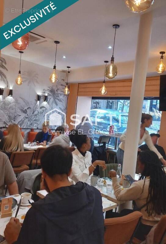 Photo 1 - Commerce à PARIS-18E