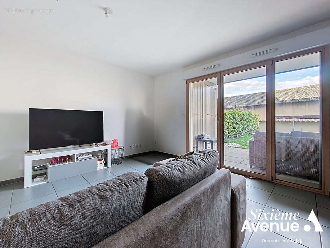 Appartement à Saint-Symphorien d'Ozon, 3 pièces, 65m², rez-de-jardin - photo 2