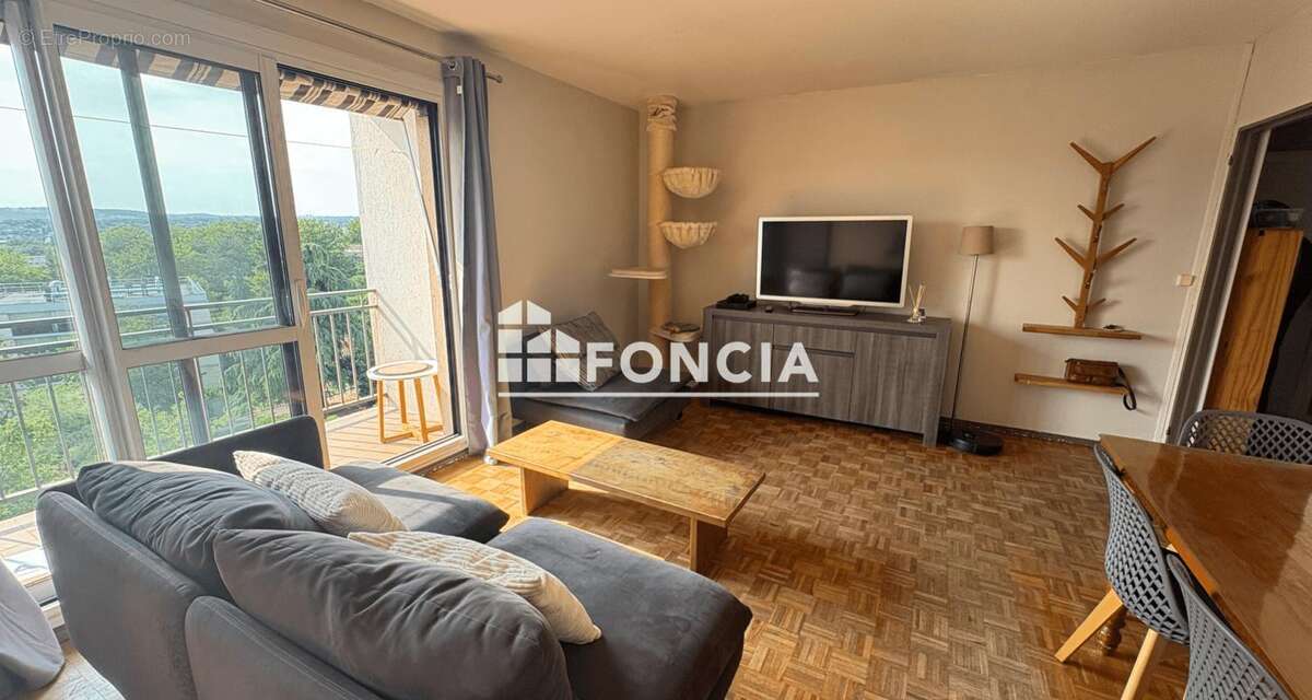 Appartement 3/4 pieces en dernier etage - photo 2