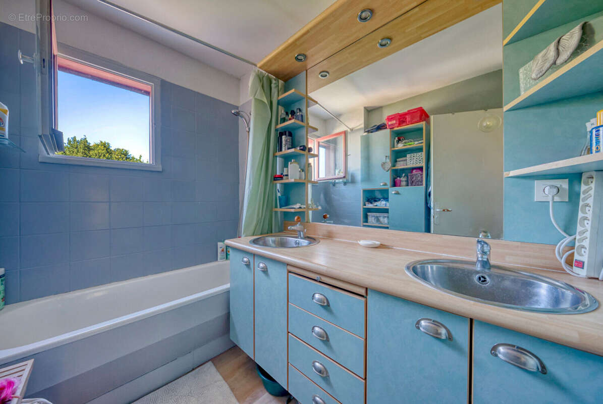 Appartement T4 - Longs Champs - photo 7