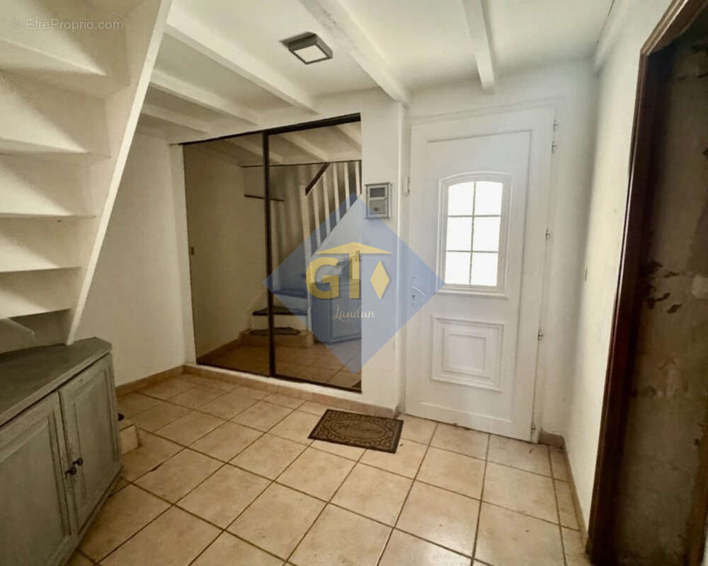 Maison à LAUDUN-L'ARDOISE