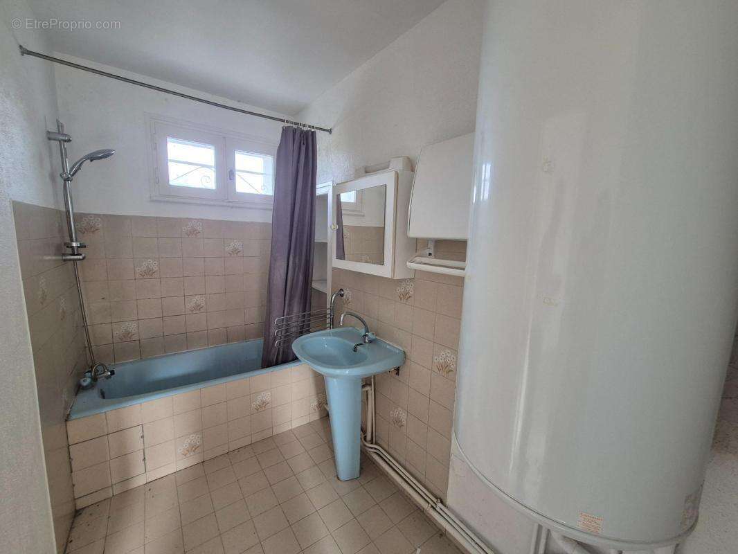 Appartement à VEAUCHE