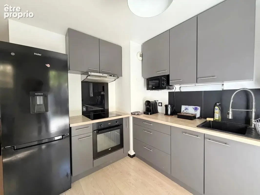 3 pièces en rez-de-jardin avec terrasse et jardin de 46m² - photo 3