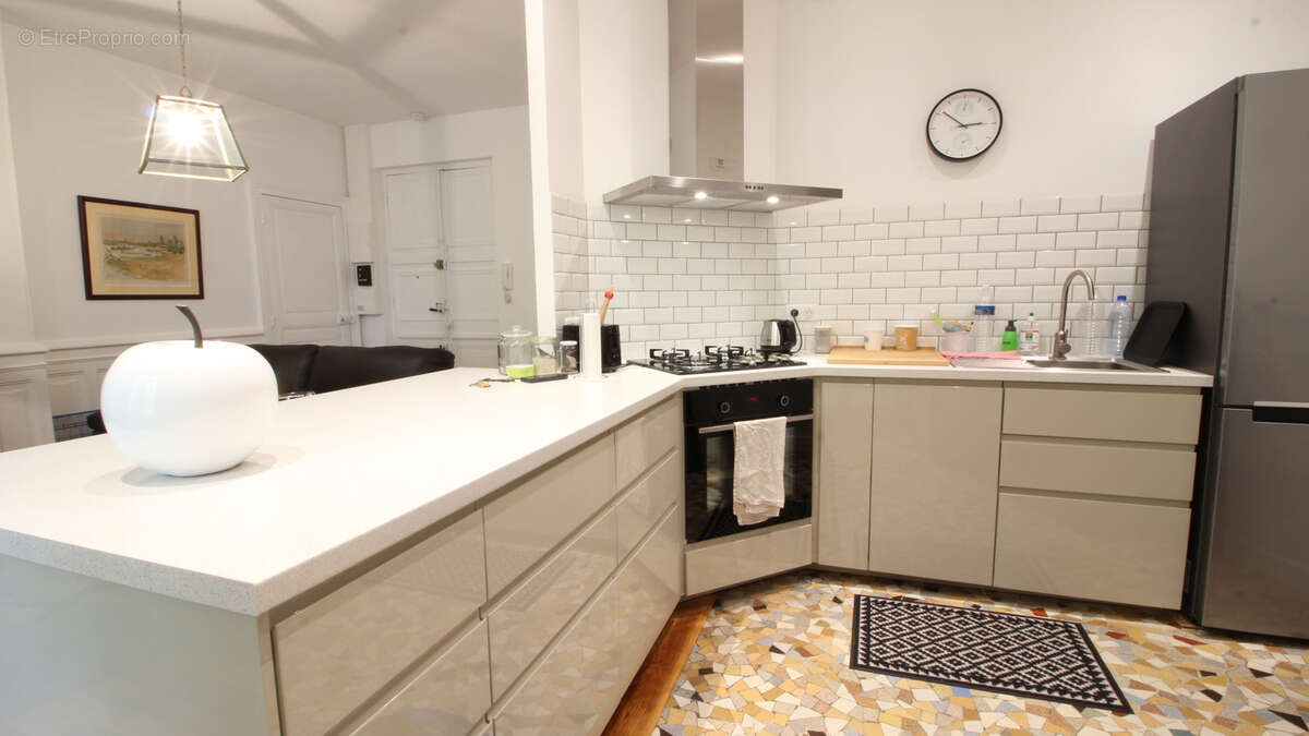 Bel appartement T2 avec ascenseur en centre-ville de Vichy avec cave et mansarde - photo 6