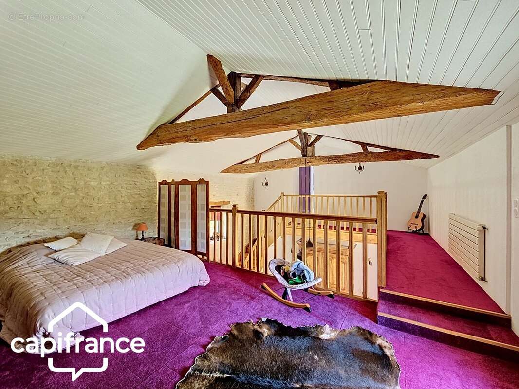 Maison en pierre de caractère 195 m² – 3 chambres – mezzanine – terrain 1 606 m² – Saint-Martin-de-Sanzay proche Saumur, Montreu - photo 7