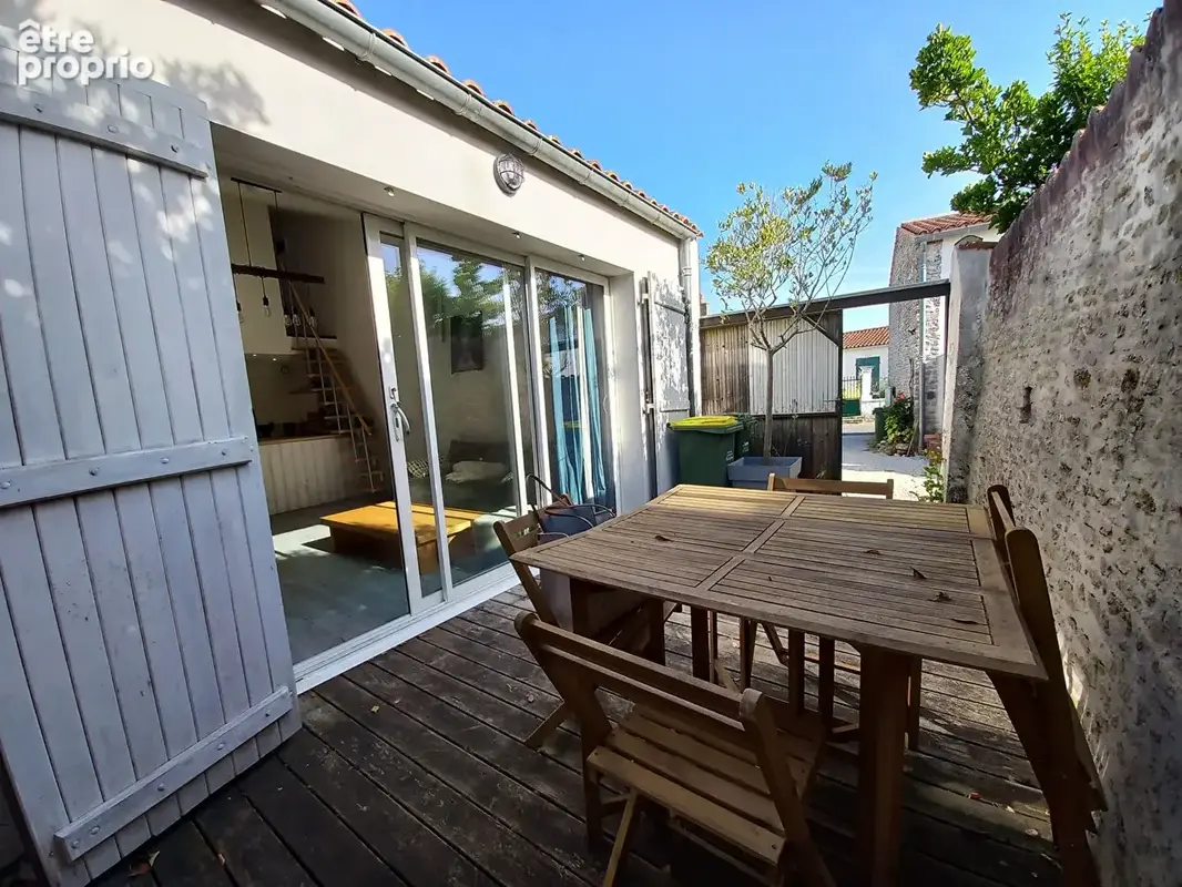 Ancien chai rénové de 57 m² avec patio : charme et authenticité ! - photo 1