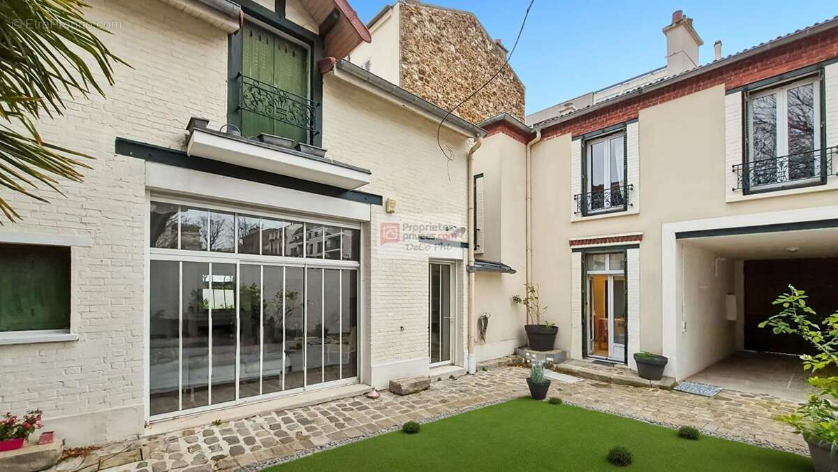 Suresnes centre-ville bas  grande maison d'exception - photo 17