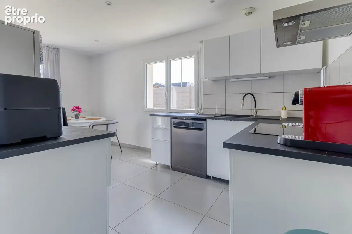 Maison 90 m² à Saint-Denis-Les-Bourg  - photo 5