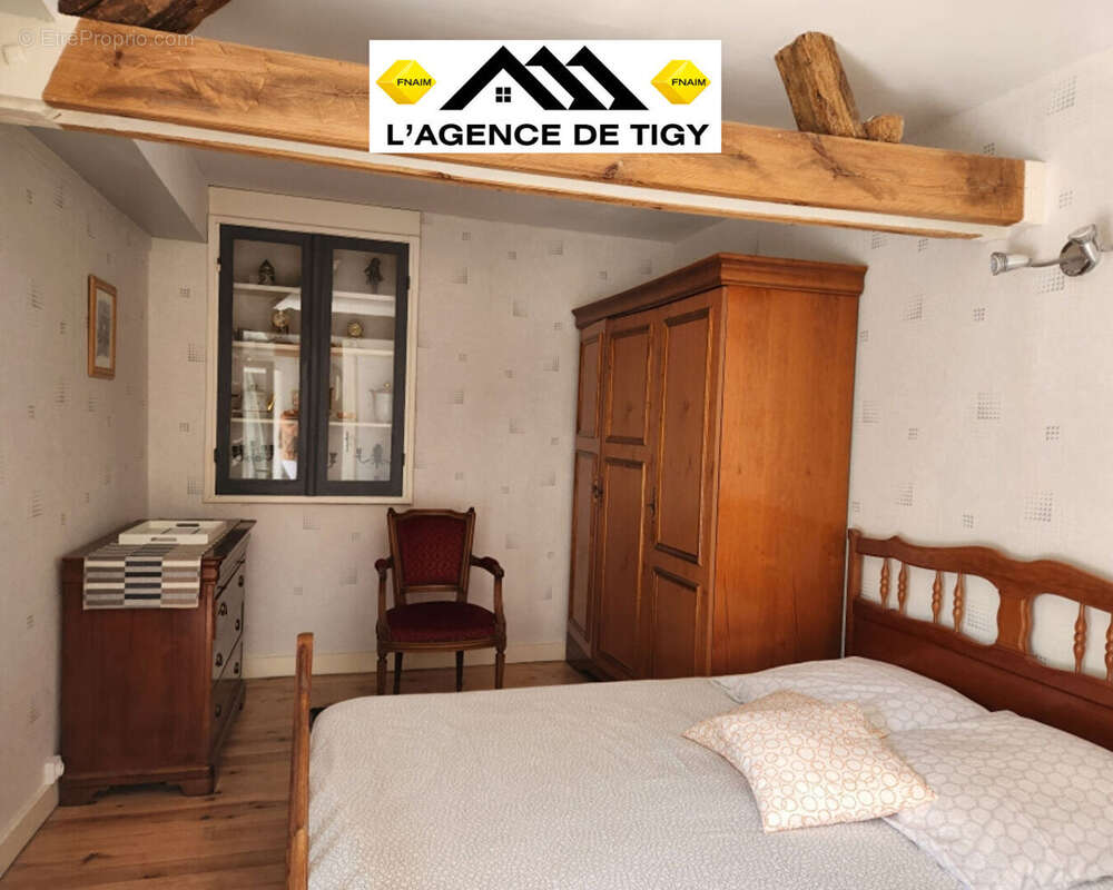 A vendre une charmante maison - photo 4