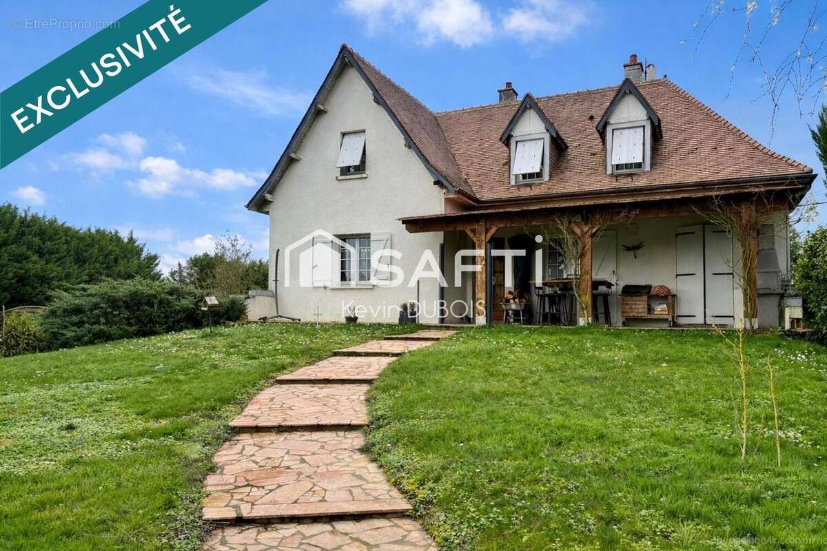 Photo 2 - Maison à LENCLOITRE