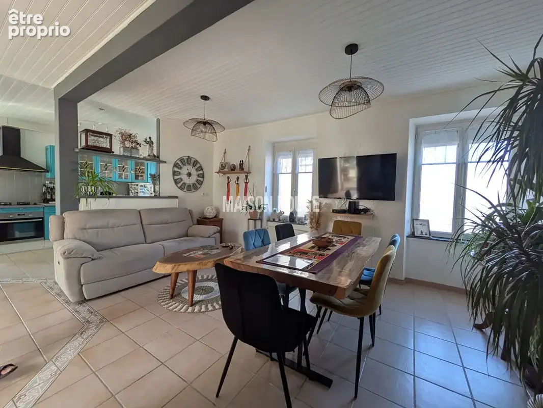 Élégante maison en pierres rénovée à Saint-Lormel avec 4 chambres et vaste terrain constructible - photo 3