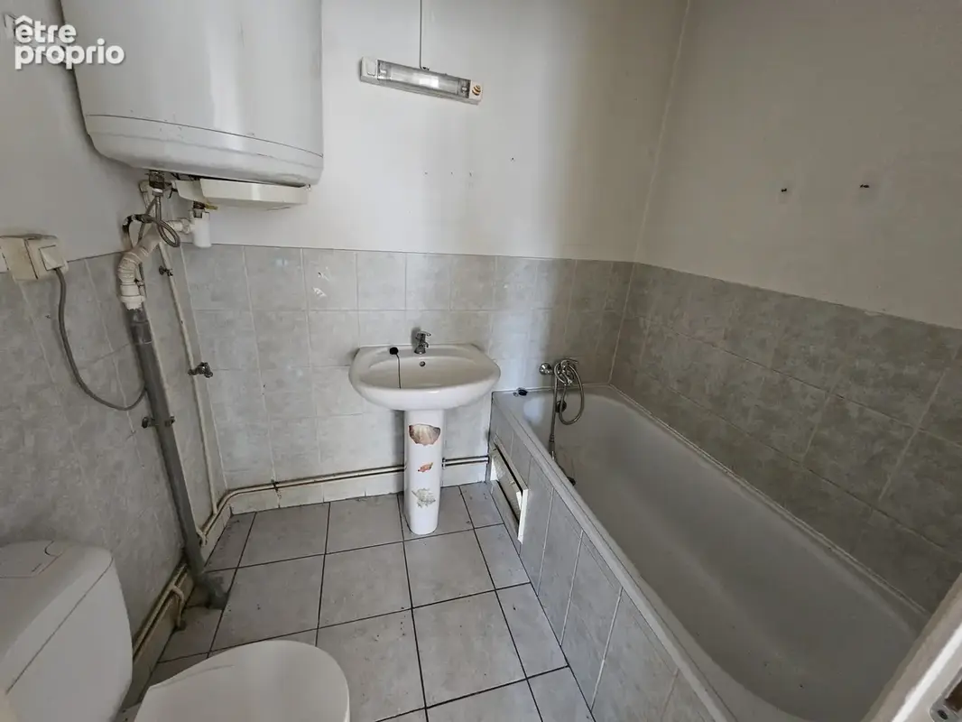 Immeuble de rapport, 5 lots : 4 logements et 1 commerce, dont 2 déjà loués, rendement 14,5% travaux compris - photo 11
