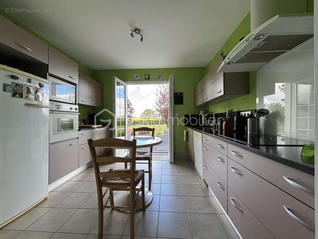 Maison à DANGE-SAINT-ROMAIN