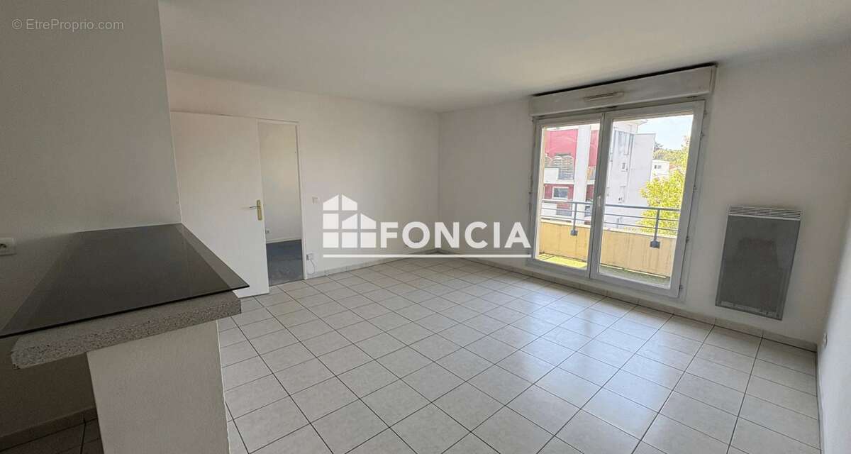 Proche RER - 2 pièces avec balcon et parking - photo 4