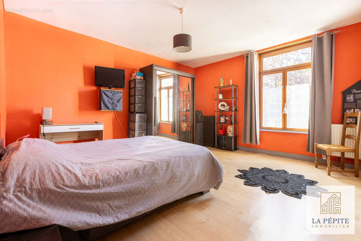 Maison familiale 131 m2 - 4 chambres - Jardin - DPE C - Saint-Amand-les-Eaux - photo 14