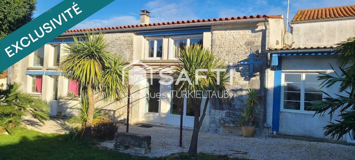 Photo 1 - Maison à SAINT-PORCHAIRE