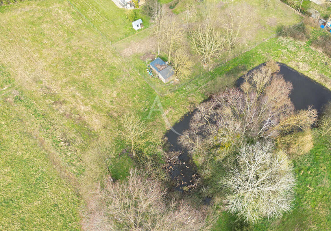Terrain Constructible  non viabilisé avec étang Prée D'Anjou 6772 m² - photo 2
