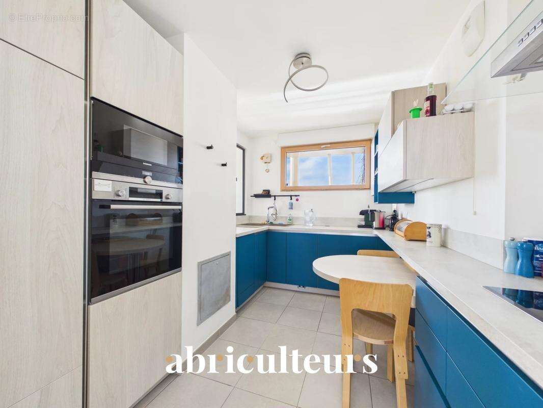 Appartement de caractère de 119 m² avec balcon et terrasse dans un Immeuble d’architecte à la vente à Aubervilliers (93300) - photo 12