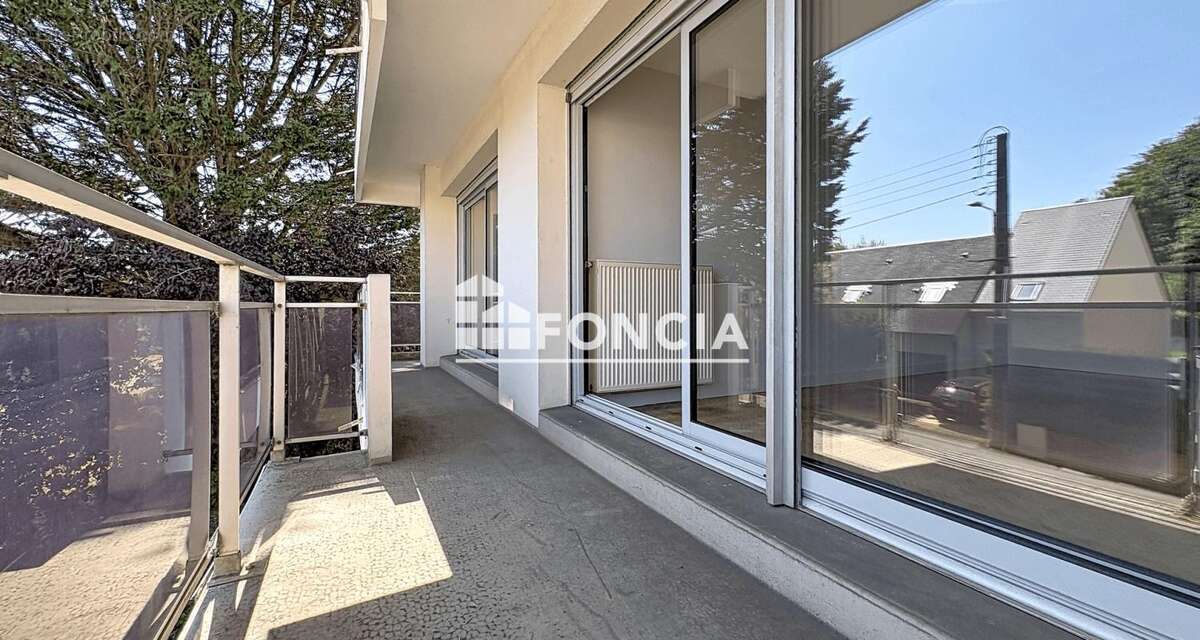 Appartement t4 - 3 chambres - ascenseur - parking - cave - balcon - photo 7