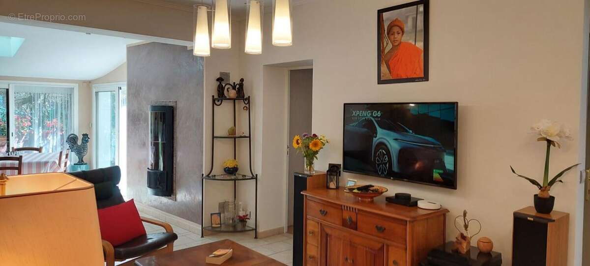 Immeuble avec 2 appartements + garage + caves - photo 6