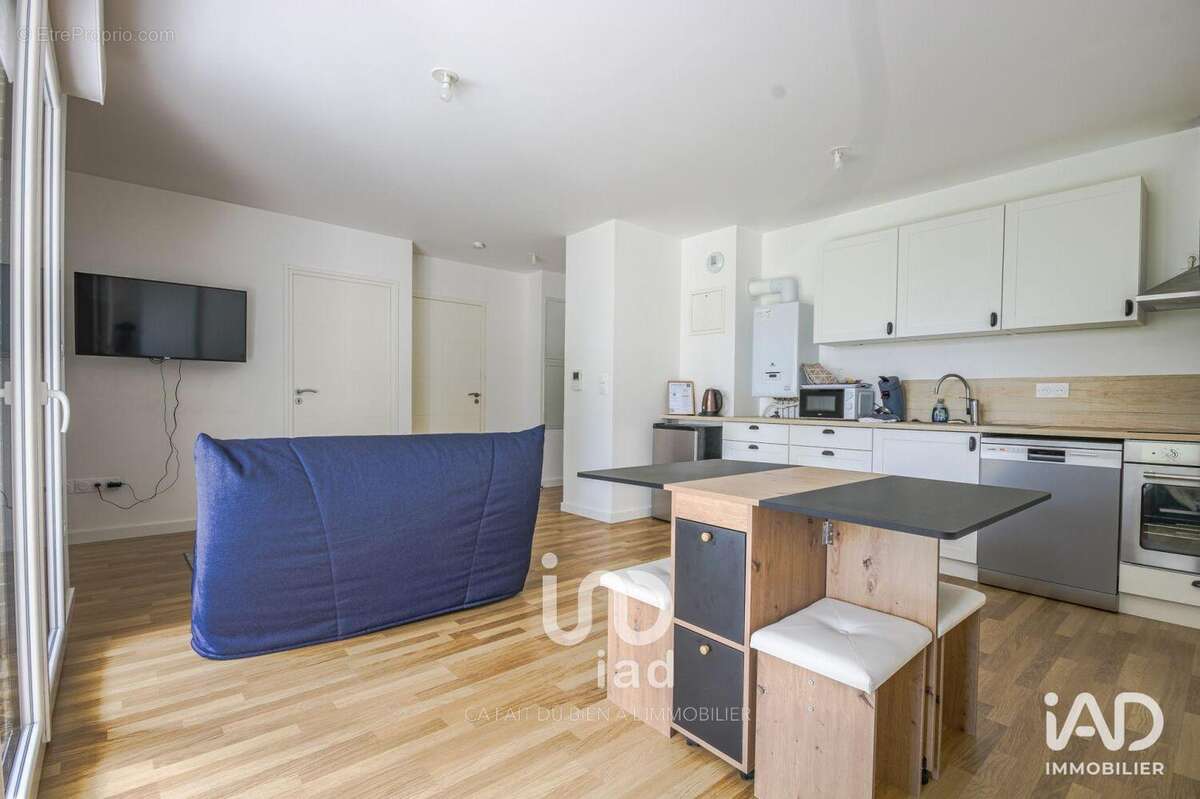 Photo 2 - Appartement à LE MESNIL-ESNARD