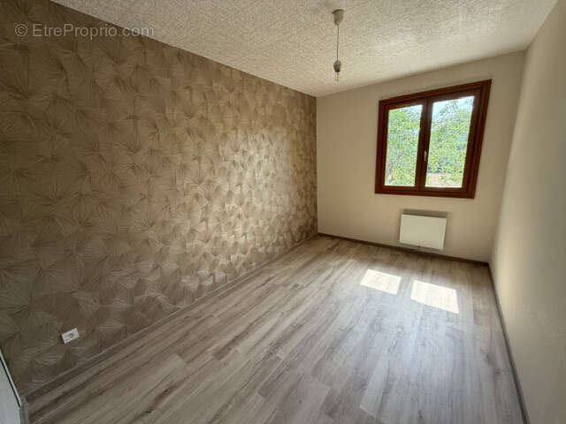 Maison de plain-pied avec garage sur terrain de 900 M2 - photo 13