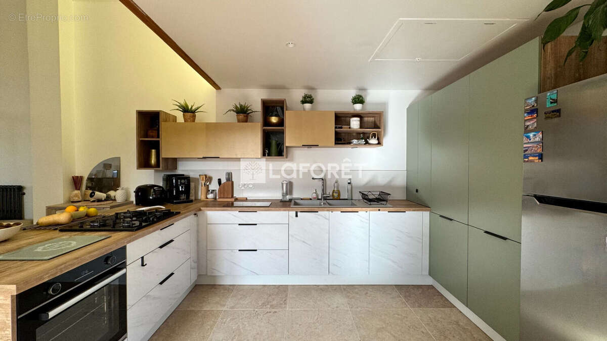 Maison à SOURCIEUX-LES-MINES