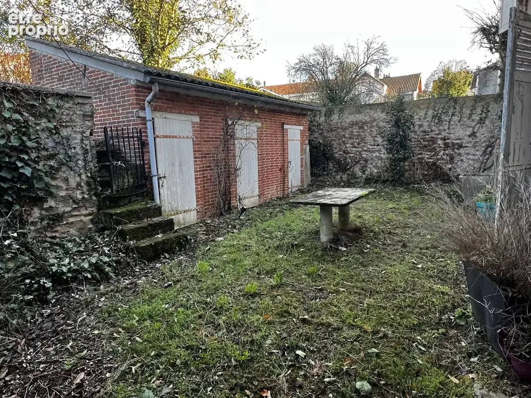 Imposante maison individuelle à rénover au centre-ville - photo 17