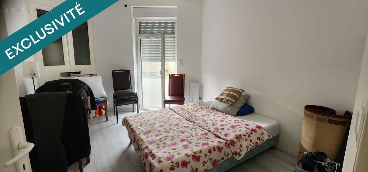 Photo 3 - Appartement à LA CHAPELLE-GLAIN