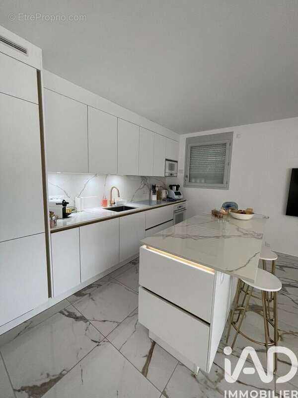 Photo 2 - Appartement à SAINT-GENIS-POUILLY