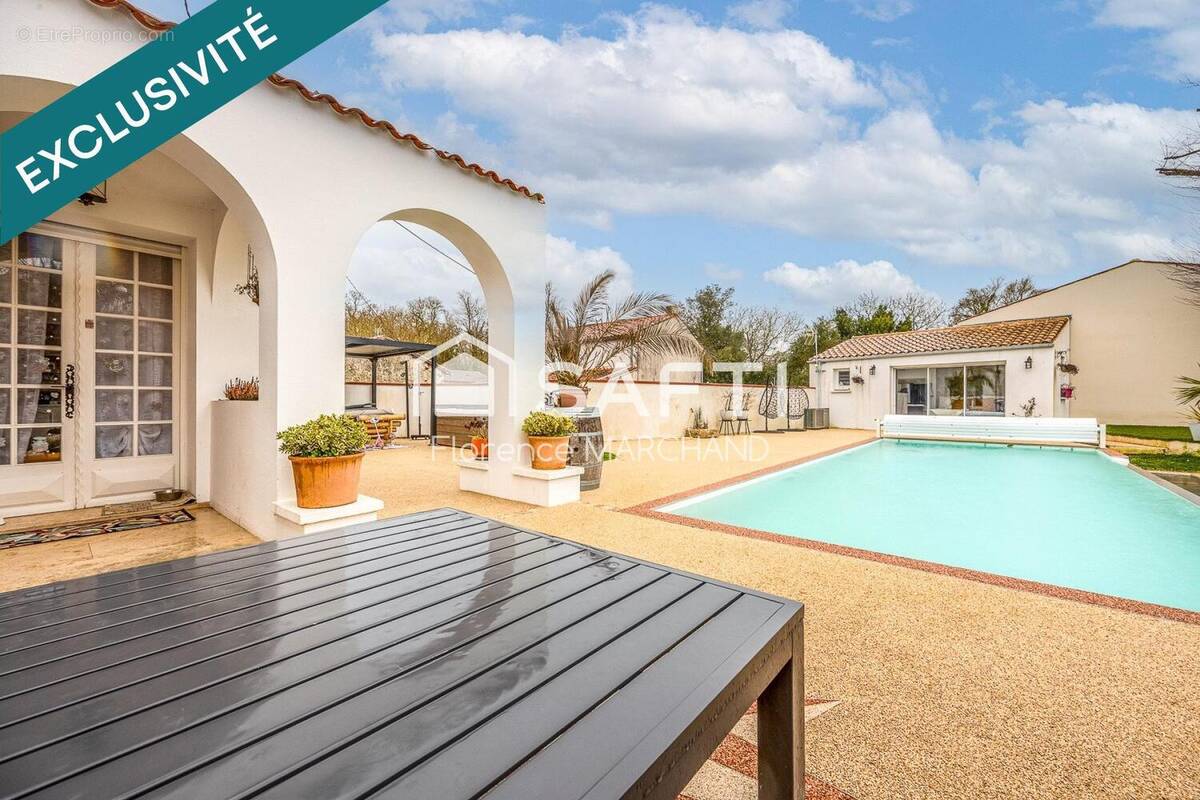 Photo 1 - Maison à AIGREFEUILLE-D'AUNIS