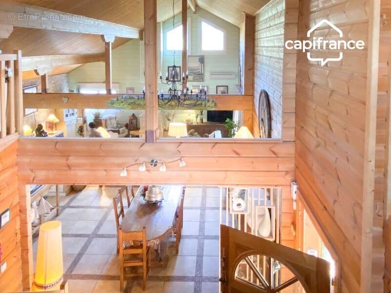 01300 cuzieu maison bois massif type chalet, 146 m² ,plain-pied terrasse, garage,piscine, terrain 1100 m2 - photo 6