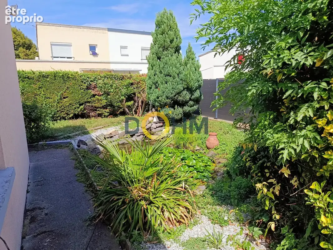 Maison de 102m2 mitoyenne d'un coté - photo 12