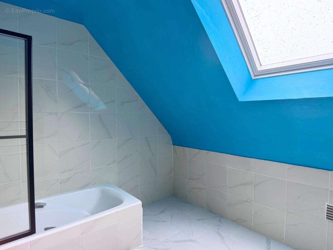 RENNES LA POTERIE – Maison familiale 136 m² avec jardin, véranda et garage - photo 13