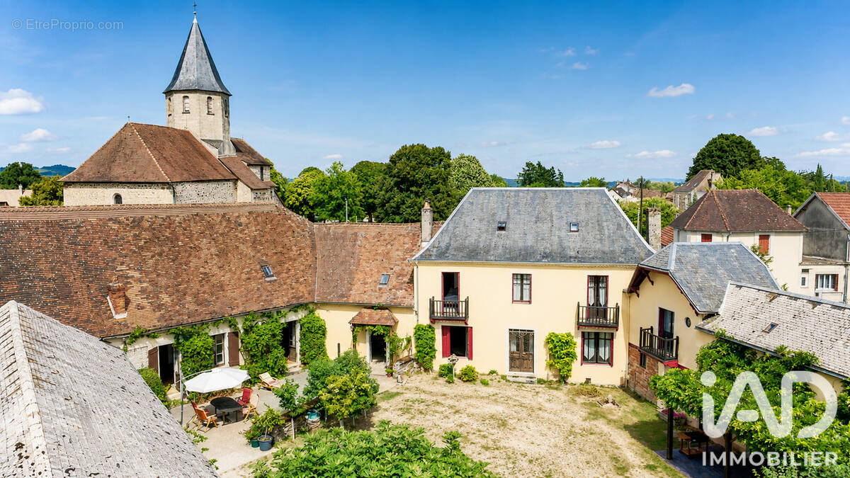Photo 1 - Maison à SAINT-PRIEST-LES-FOUGERES
