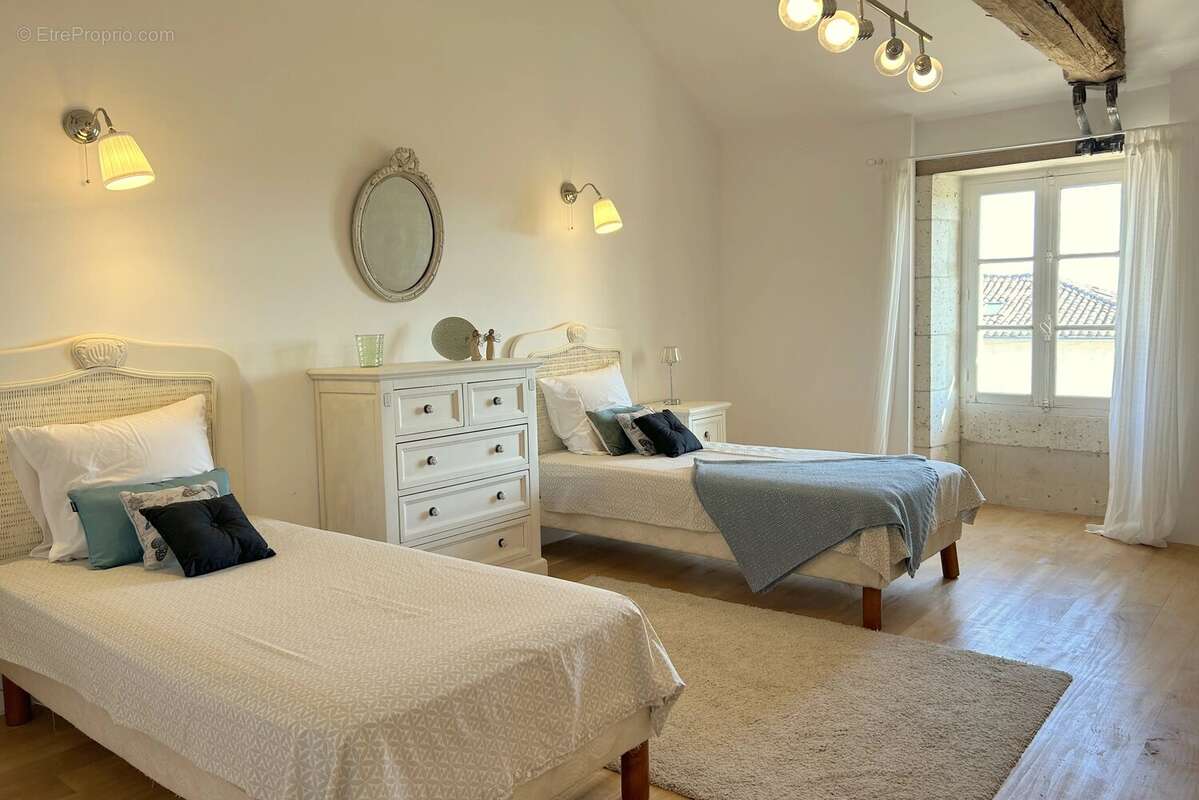 Maison de caractère rénovée de 3 à 4 chambres - photo 13