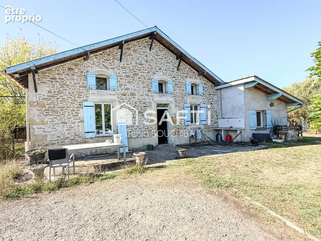Photo 1 - Maison à LE TUZAN