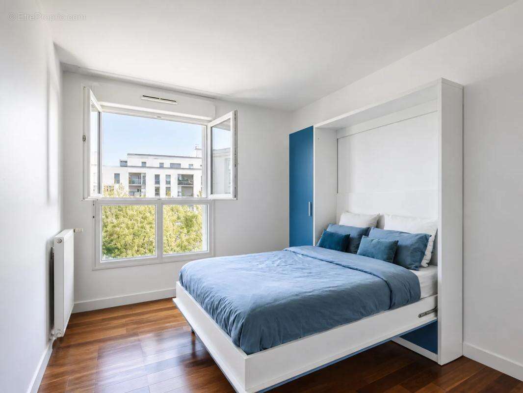 Charmant 4 pièces à Nanterre avec balcons - jardin collectif ! - photo 11