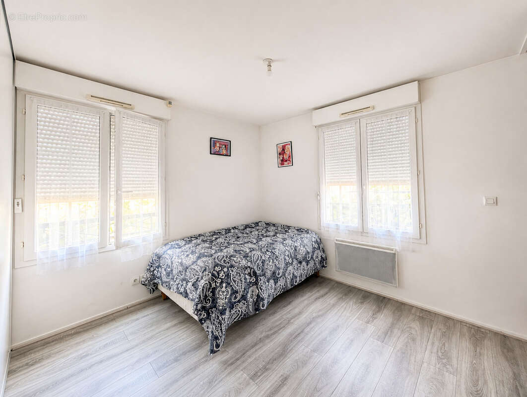 Maison 4 pièces de 100m2 avec 3 chambres et un jardin - photo 7