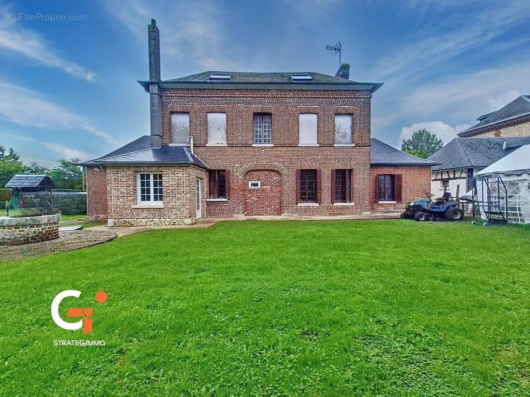 Maison à SAINT-OUEN-DE-THOUBERVILLE