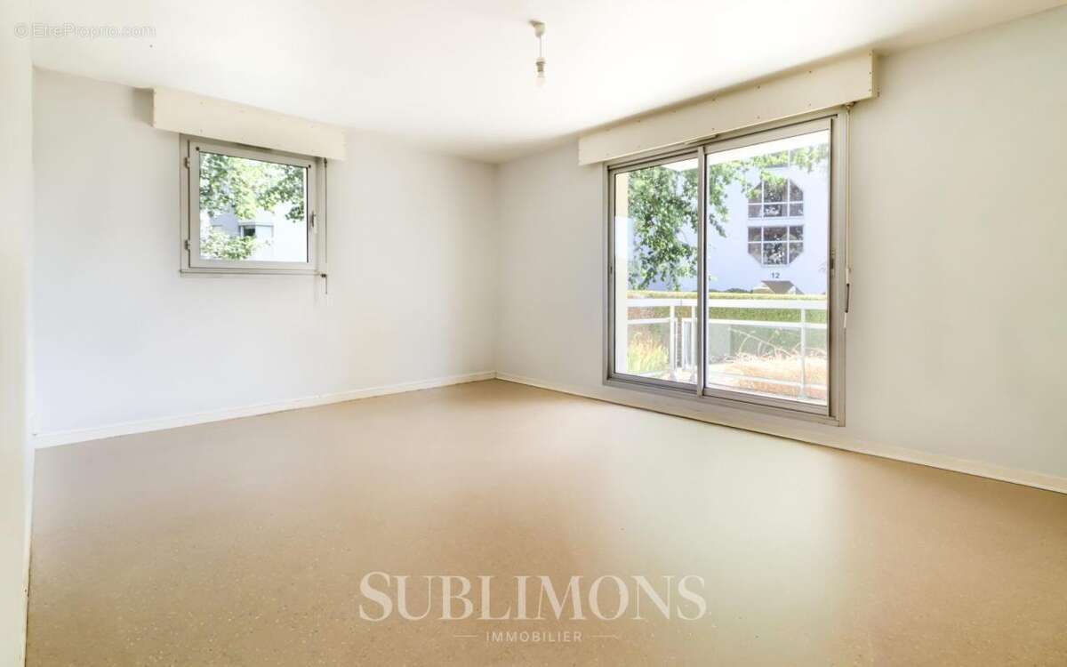 Appartement T3 avec jardin - photo 3