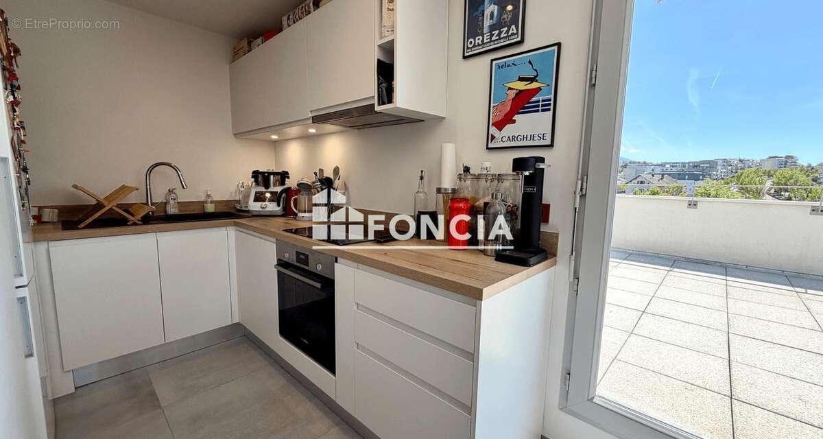SEYNOD – Appartement T3 dernier étage avec terrasse de 35 m² plein sud et vue montagnes - photo 8